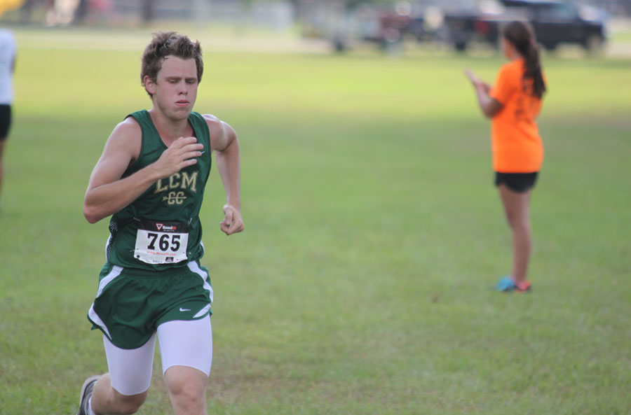 Junior Aaron Rose races to the finish line. 