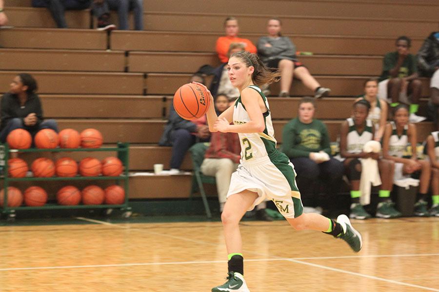 Junior Josie Nimitz drives to the basket for the Lady Bears. 
