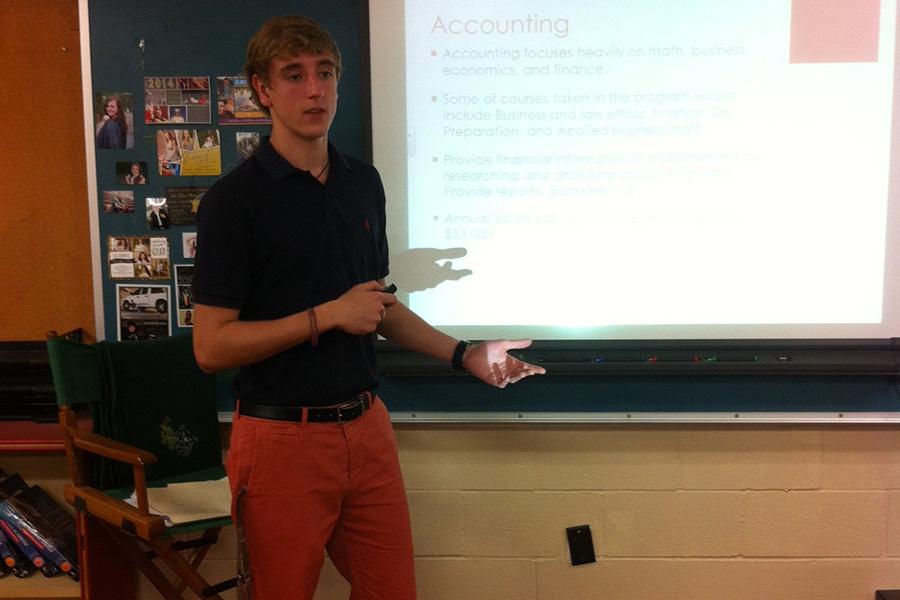 Senior James Armstrong showcases the proper attire while presenting in his Government class. 