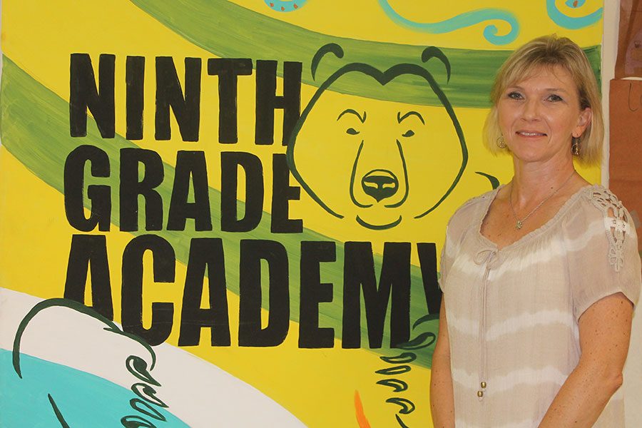 Art teacher Betsy Kaufman painted this Ninth Grade Academy sign that hangs in one of the LCM High School hallways. 