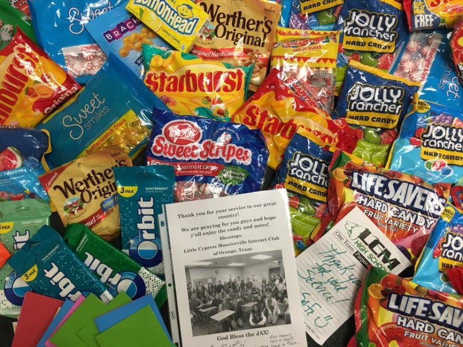 Interact Club members donated candy for sailors on board the USS Jacksonville. 