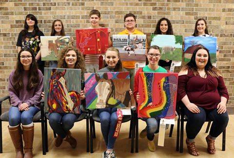 LCM art students show off their successful Rodeo Art pieces.