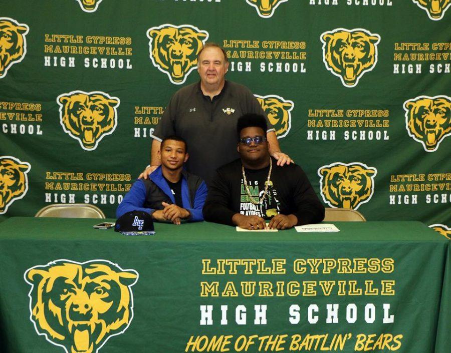 Senior Brandon Jenkins is pictured with fellow senior Trey Guillory and LCM athletic director Randy Crouch on National Signing Day. 