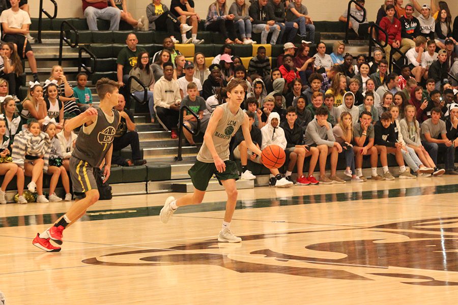 Sophomore Scout Denman and junior Braden Bridges scrimmage during the first annual Midnight Madness last week. 