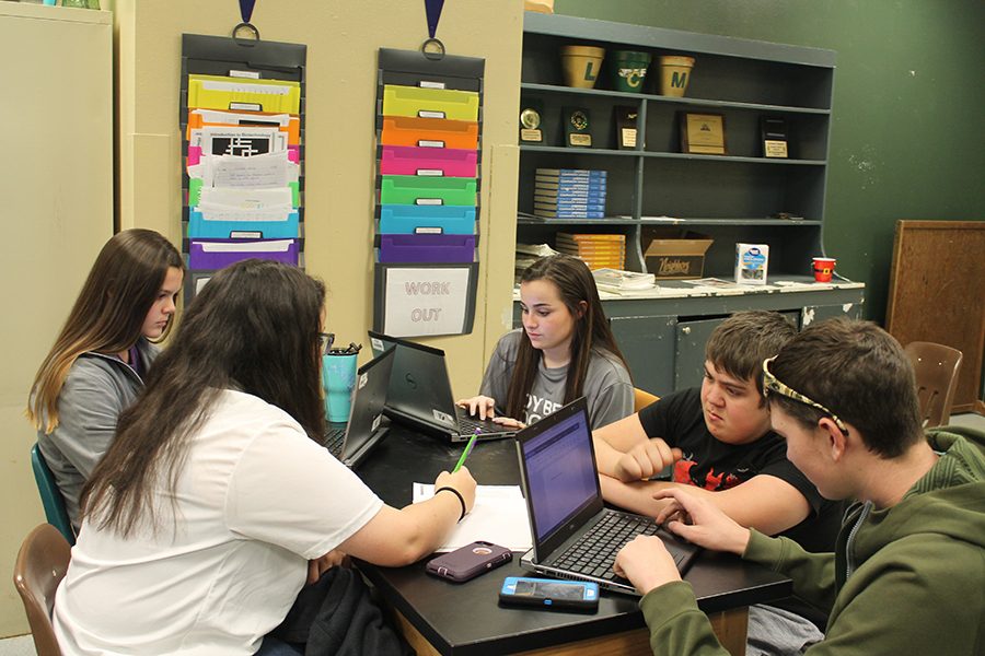 Students in Sarah Trammells class work on a bio-tech project. 