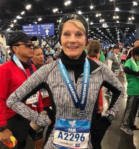 High school receptionist Pam Guidry recently ran in the Chevron Houston Marathon. 