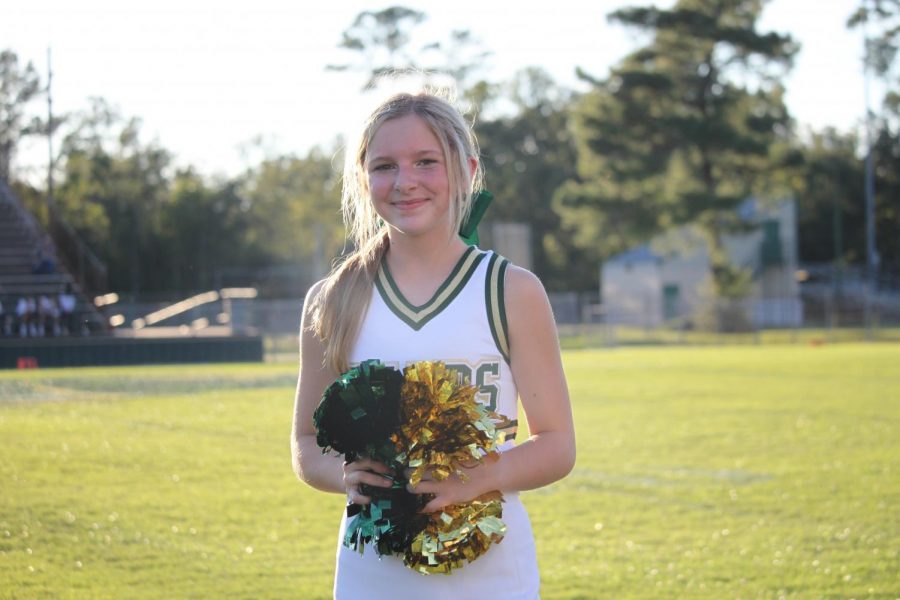 Freshman Kyndall Davis is a cheerleader and also marches in the Battlin Bear Band.  