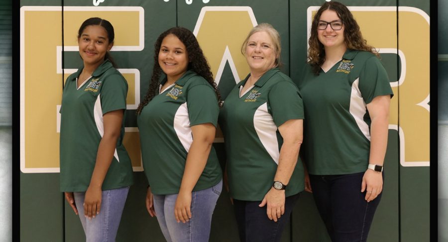 The student trainers are a huge help to the athletic trainer, Sheri Hoffpauir. Pictured from left to right are: Paitton Johnson, Tristen Doe, Sheri Hoffpauir, and Tiffany Cates. 