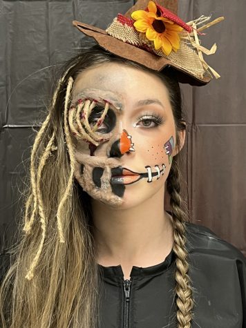 Junior Allie Jo Smith won the Glow Up makeup contest with her scarecrow look. 