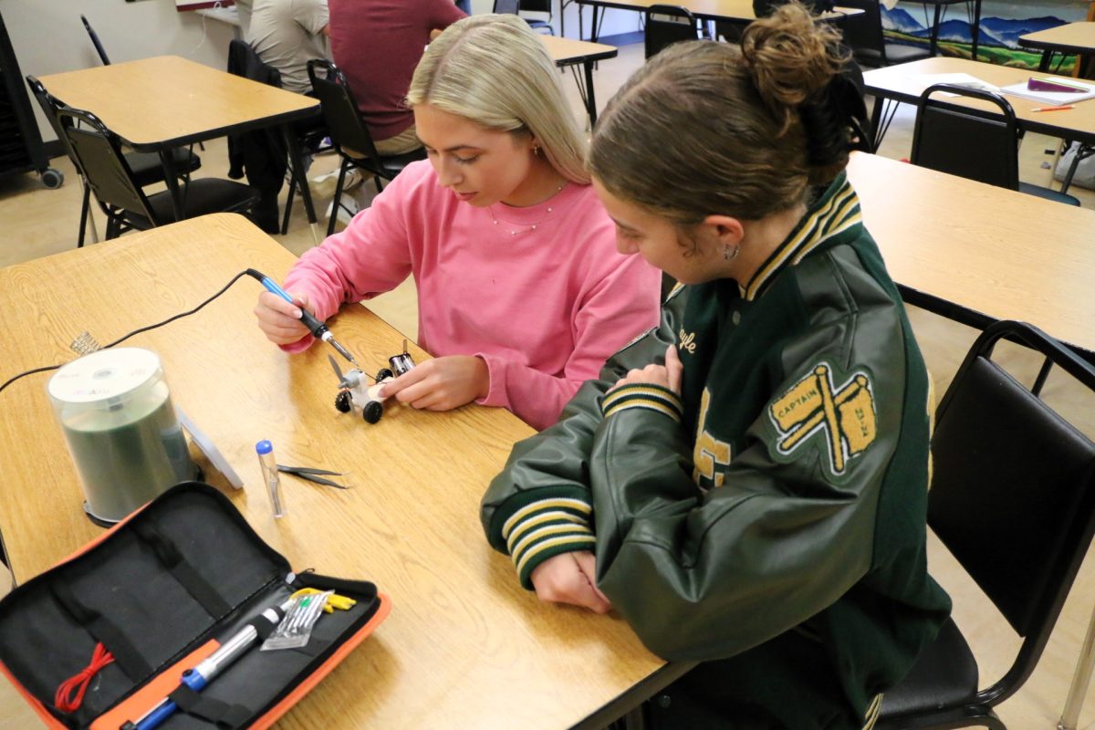 Seniors Chloe Wells and Abigayle Welch work on a project in Jeff Colliers senior engineering class. 