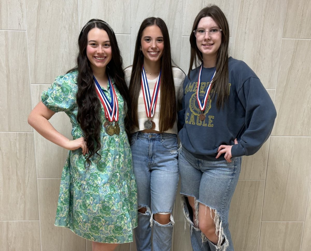 The journalism team placed second at the Sabine Pass Shark Meat on Saturday. Pictured from left to right are Gabrielle Moore, Annabelle Claybar, and Jaci Barfield. 