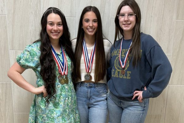 The journalism team placed second at the Sabine Pass Shark Meat on Saturday. Pictured from left to right are Gabrielle Moore, Annabelle Claybar, and Jaci Barfield. 