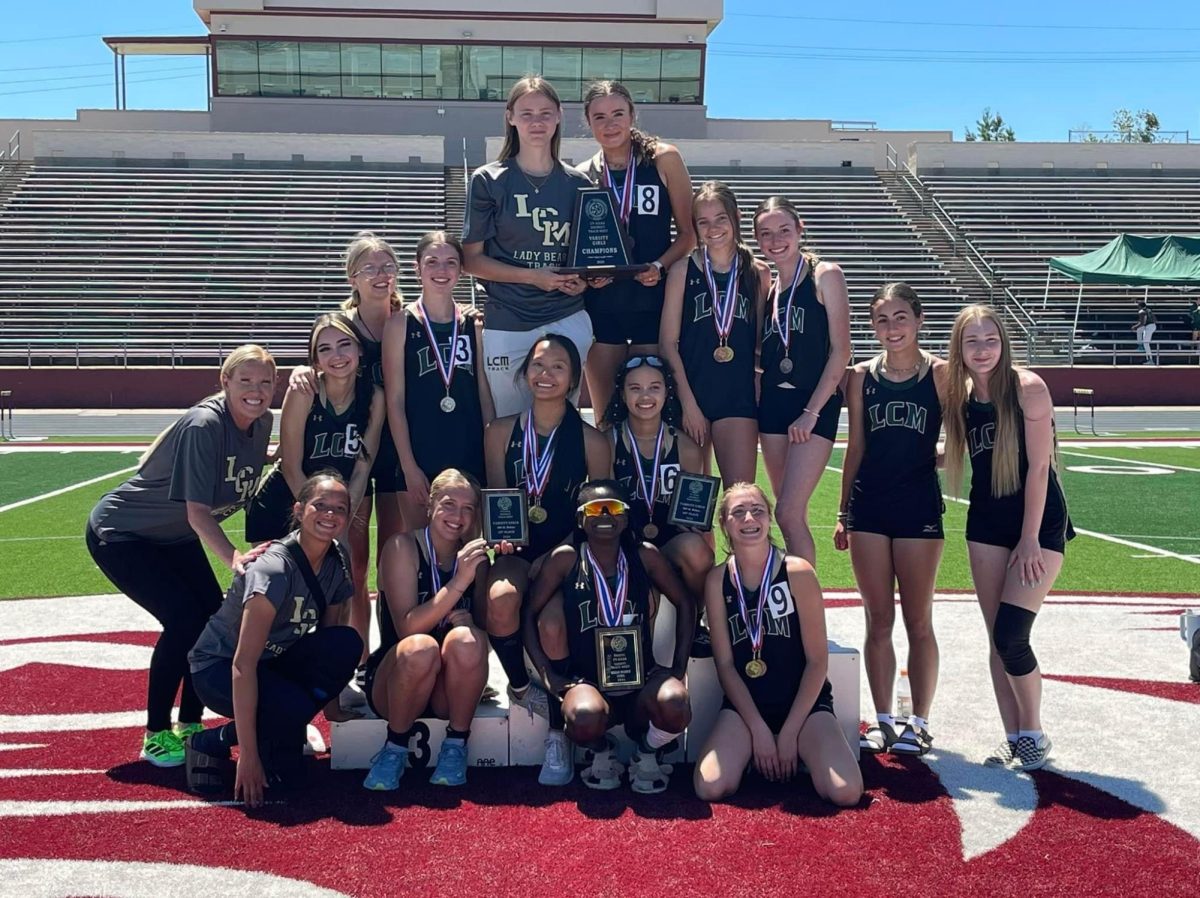 The Lady Bear Track team won the district championship for the second year in a row. 