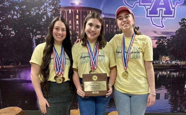 The Journalism team placed first overall for the second year in a row. Pictured from left to right are Gabrielle Moore, Rayna Christy, and Camille Kelly. 
