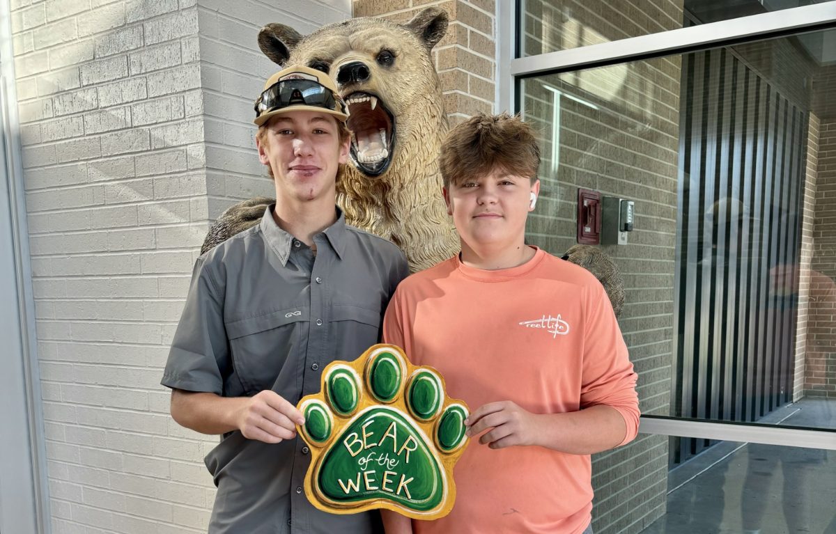 Juniors Clay Darby and Colt Dryden help put up and take down the bear and horn at all of the home football games. 