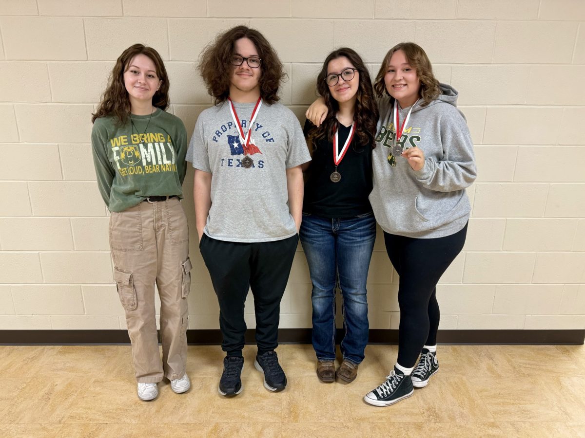 The journalism team placed second overall at the Bridge City meet. Pictured from left to right are Laura Hughes, Louis McClelland, Liberty Trupke, and Laken Hardy. 