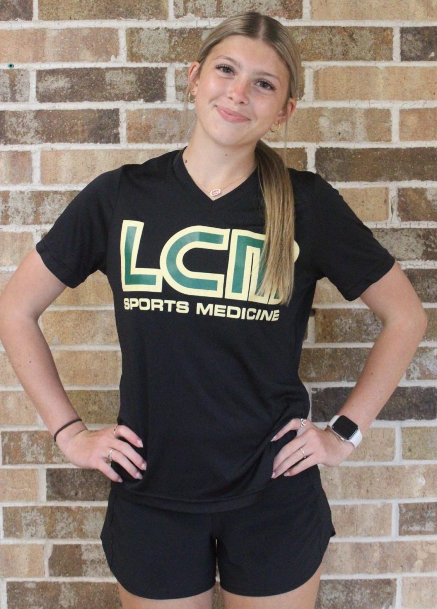 Junior Abigail Cole works hard as an athletic trainer. 