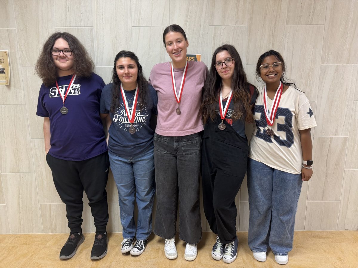 Pictured from left to right are Louis McClelland, Bailey Gorham, Taylor Huckaby, Liberty Trupke, and Jannath Bhojani. Not pictured is Annabelle Claybar. 
