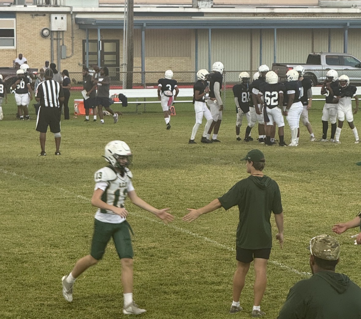 Luke McDow coaches and motives his athletes during a game. 