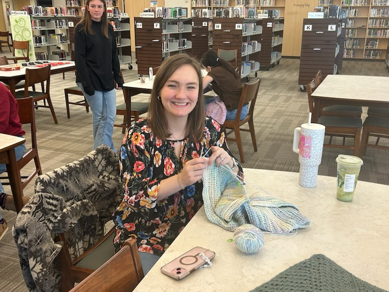 Art teacher Kaitlyn Sweeney is one of many high school teachers to join the new faculty crochet club. 