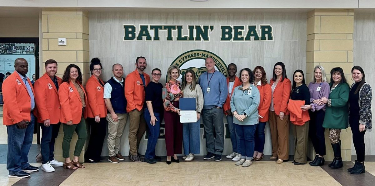 English teacher Jill Shugart is awarded the Greater Orange Area Chamber of Commerce Employee of the Month.