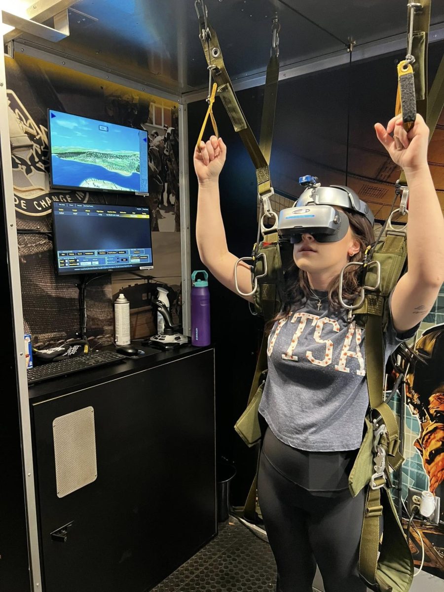 Senior Shayne Pannell engages in an activity on the STEM truck.